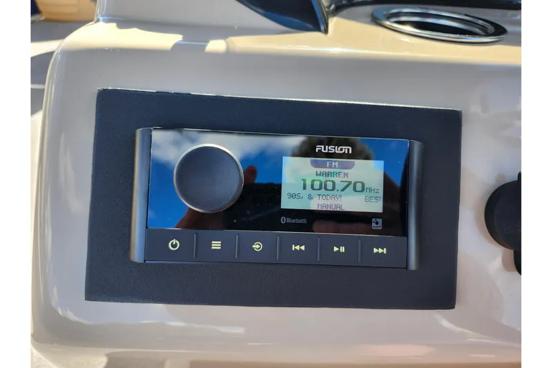 Slide: The Image of Fusion radio display on 2018 Sun Tracker Fishin' Barge 22 DLX boat dashboard. - 31