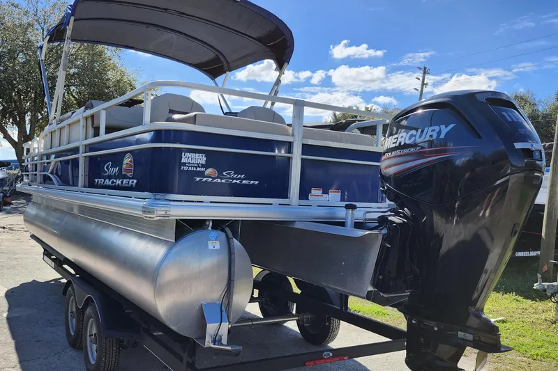 Slide: The Image of 2018 Sun Tracker Fishin' Barge 22 DLX pontoon boat with Mercury outboard motor. - 4