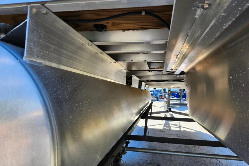 Slide: The Image of Underneath view of a 2018 Sun Tracker Fishin' Barge 22 DLX pontoon boat. - 6