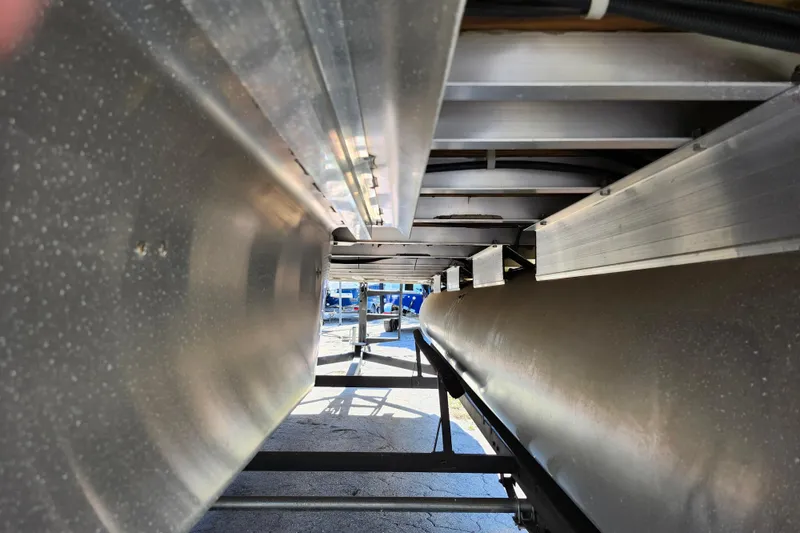 Slide: The Image of Underneath view of a 2018 Sun Tracker Fishin' Barge 22 DLX pontoon boat. - 7