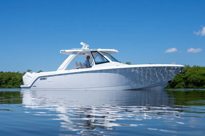 Slide: The Image of Intrepid 35 PANACEA 2026 on calm water. - 0