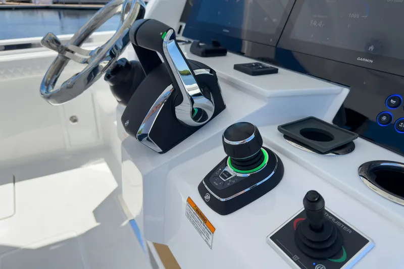 Slide: The Image of Intrepid 35 PANACEA 2026 helm with advanced controls and technology. - 13
