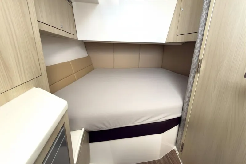Slide: The Image of Intrepid 35 PANACEA 2026 cabin with cozy bed. - 15