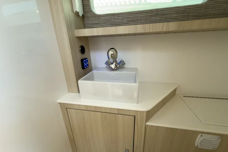 Slide: The Image of Intrepid 35 PANACEA 2026, modern bathroom with sink. - 19