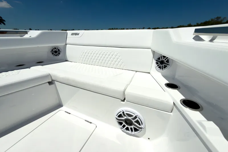 Slide: The Image of Intrepid 35 PANACEA 2026, luxurious white boat seating and speakers. - 24
