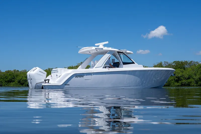Slide: The Image of Intrepid 35 PANACEA 2026 on calm water. - 3