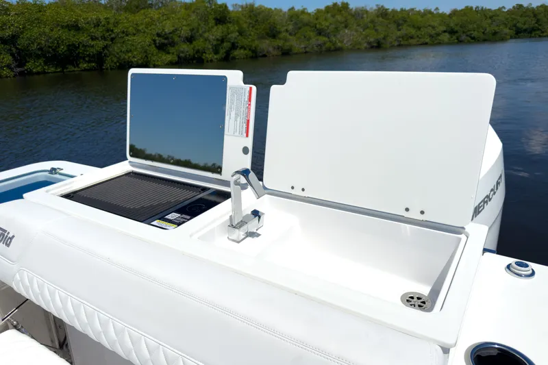 Slide: The Image of Intrepid 35 PANACEA 2026 with onboard kitchen on calm water. - 7