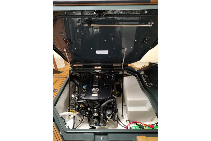 Slide: The Image of 2026 Cobalt R8 Surf boat engine compartment with open hatch. - 15