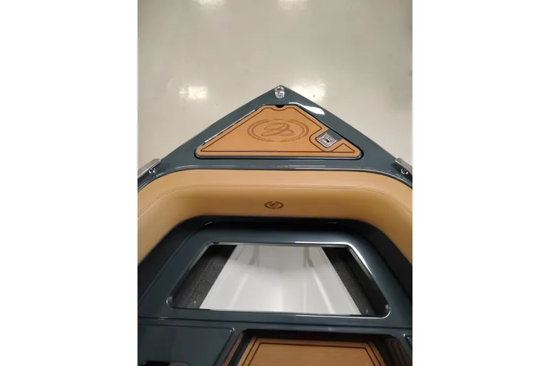 Slide: The Image of 2026 Cobalt R8 Surf boat interior with tan and gray accents. - 5