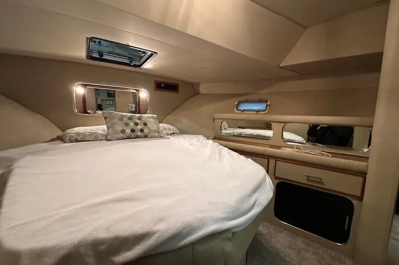 Slide: The Image of Luxurious cabin interior of 1986 Chris-Craft 381 Catalina yacht with cozy bedding. - 22
