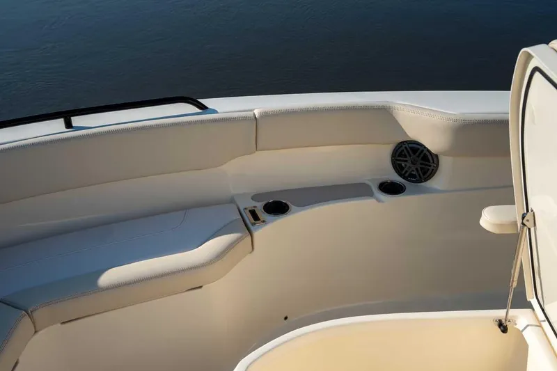 Slide: The Image of Interior of 2026 Scout 220 XSF boat with seating and cup holders. - 9