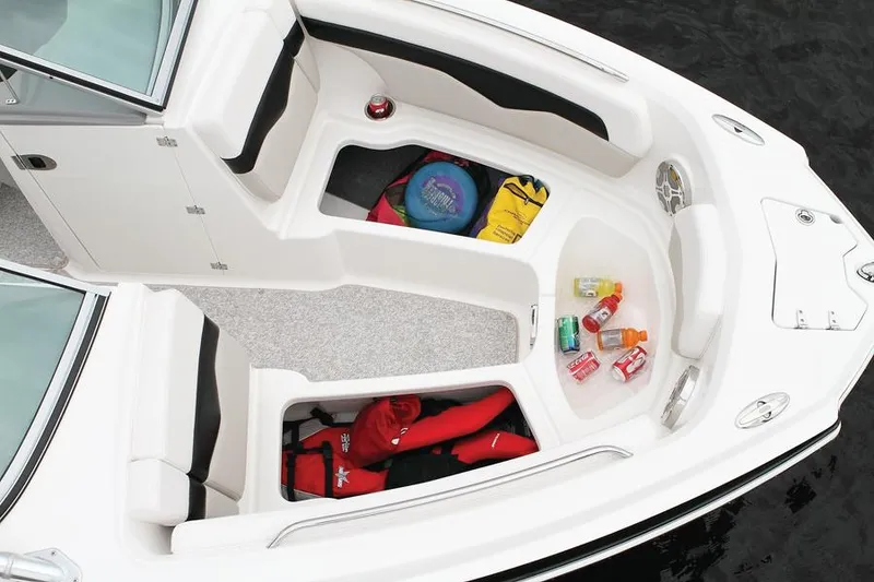Slide: The Image of Manufacturer Provided Image: 2012 Chaparral 226 SSi boat interior with storage compartments and gear. - 16