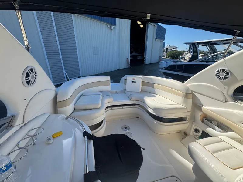 Slide: The Image of Interior of a 2002 Sea Ray 290 Bowrider boat with seating area. - 20