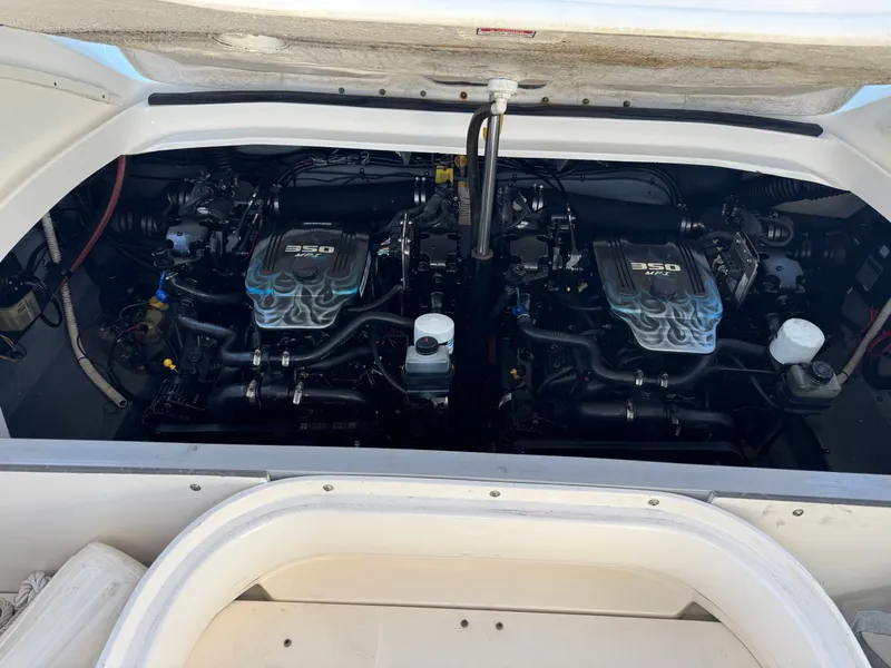 Slide: The Image of Engine compartment of a 2002 Sea Ray 290 Bowrider with 350 MPI engines. - 26