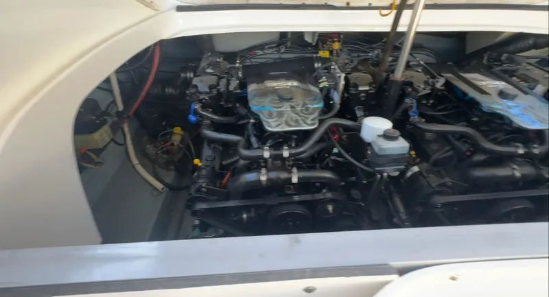 Slide: The Image of Engine compartment of a 2002 Sea Ray 290 Bowrider boat. - 27