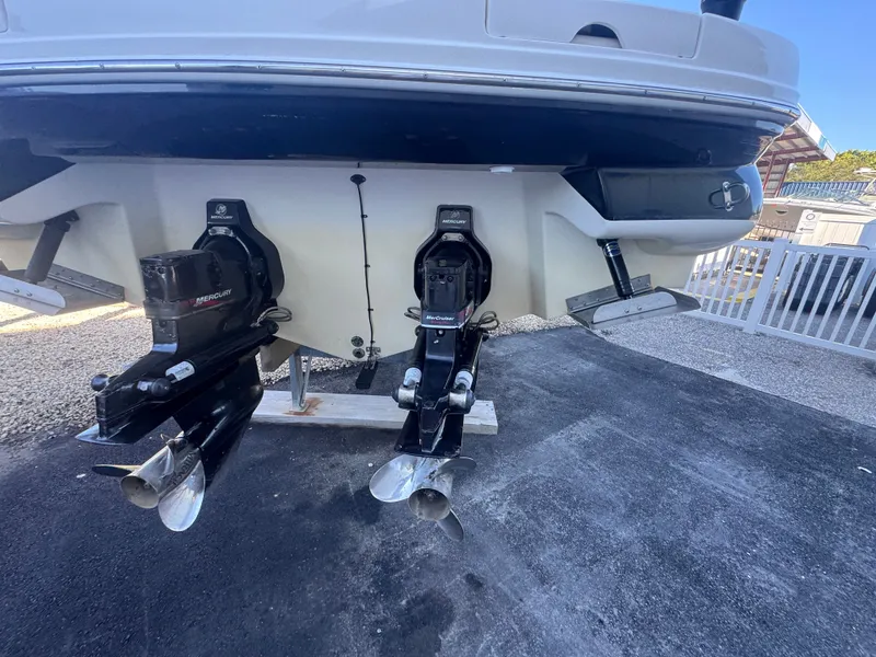 Slide: The Image of Rear view of 2002 Sea Ray 290 Bowrider with Mercury drives. - 6