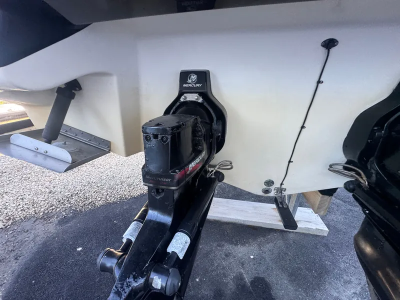 Slide: The Image of Rear view of a 2002 Sea Ray 290 Bowrider with MerCruiser drive. - 7