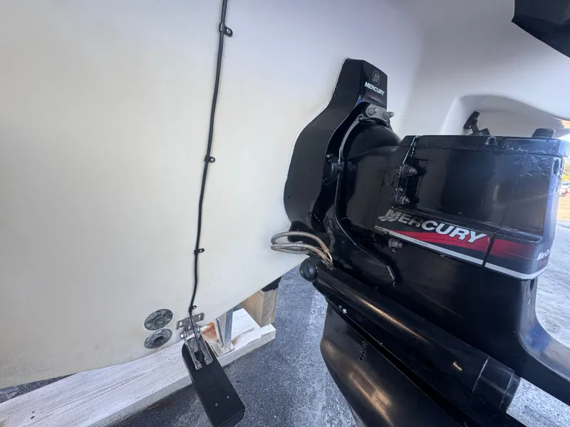 Slide: The Image of 2002 Sea Ray 290 Bowrider with Mercury engine, close-up. - 8