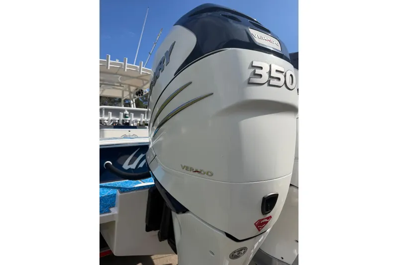 Slide: The Image of Mercury Verado 350 outboard engine on a 2004 Jupiter 31 Cuddy boat. - 11