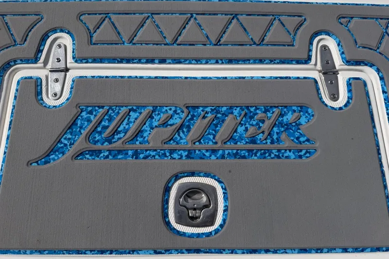 Slide: The Image of Jupiter 31 Cuddy 2004 boat deck with blue and gray design details. - 20