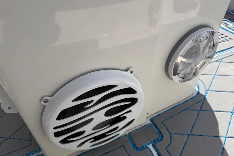 Slide: The Image of Close-up of 2004 Jupiter 31 Cuddy boat speakers on deck. - 34
