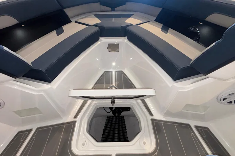 Slide: The Image of Interior view of 2026 Monterey Elite 27 OB boat with seating and storage. - 37