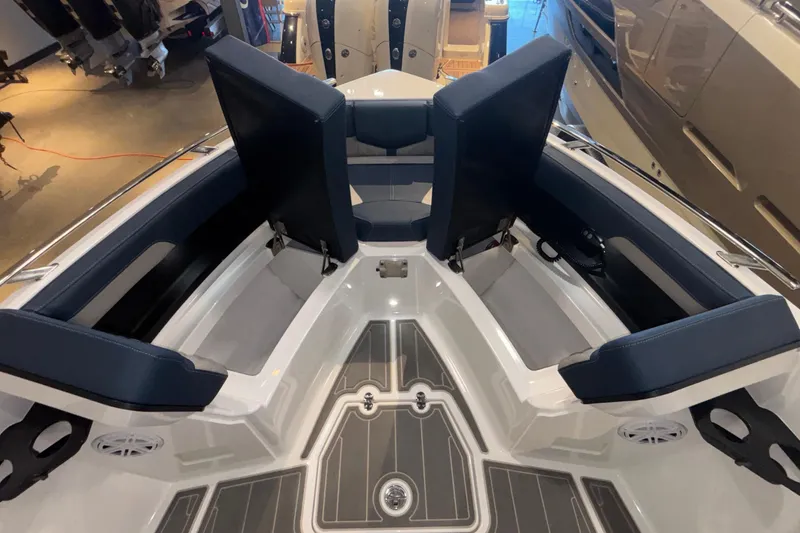 Slide: The Image of 2026 Monterey Elite 27 OB boat interior with sleek seating and modern design. - 38