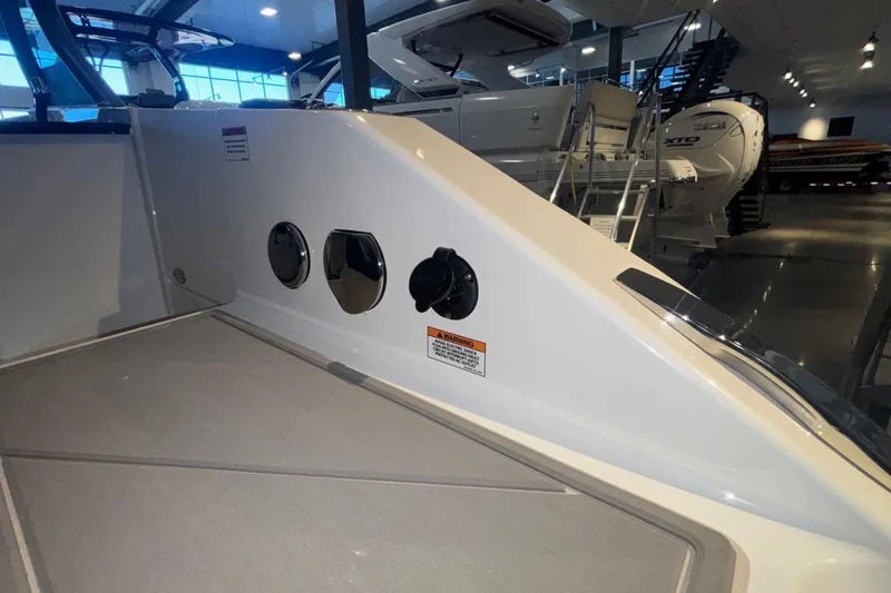 Slide: The Image of 2026 Monterey Elite 27 OB boat interior with sleek design and modern features. - 9