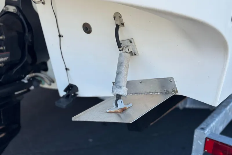 Slide: The Image of 2009 Bayliner 265 SB boat trim tab and hydraulic system detail. - 9