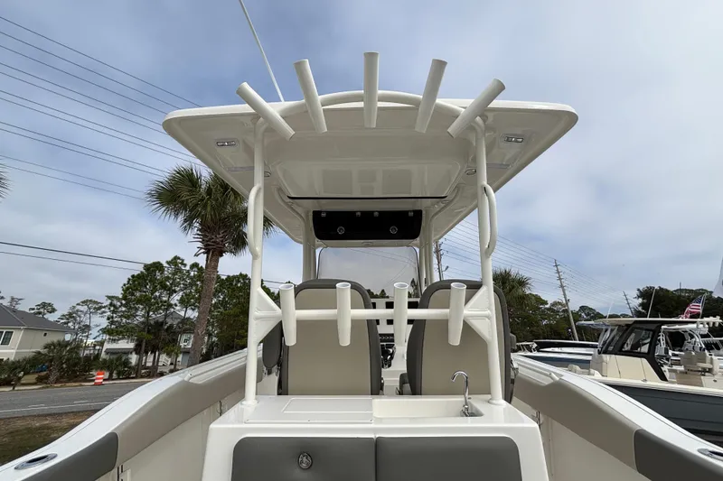 Slide: The Image of 2026 Key West 263 FS boat interior with rod holders and sink, showcasing modern design. - 23