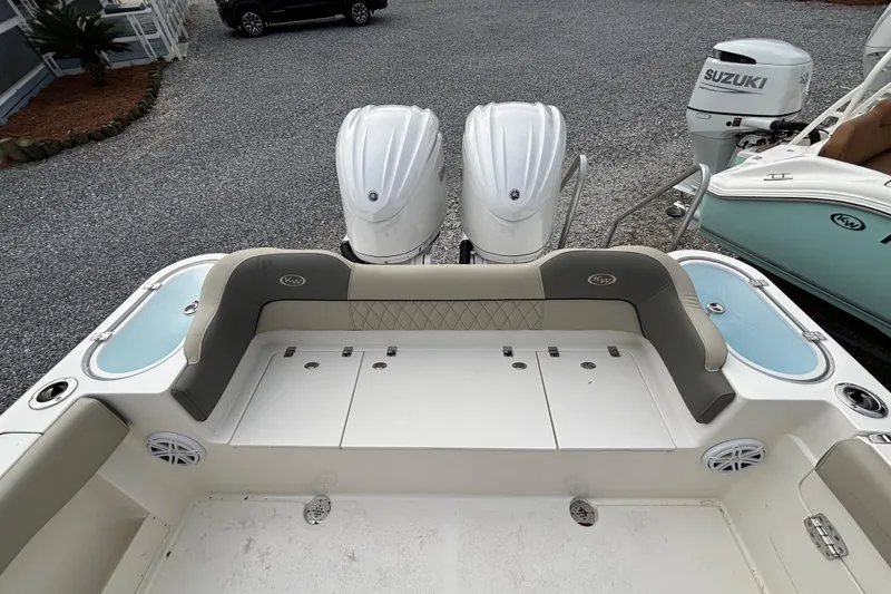 Slide: The Image of 2026 Key West 263 FS boat with dual engines and spacious seating area. - 24