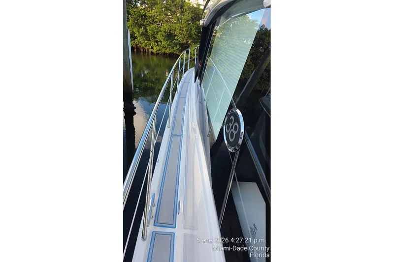 Slide: The Image of 2023 Regal 38 FXO boat deck with blue accents, Miami-Dade County, Florida. - 17