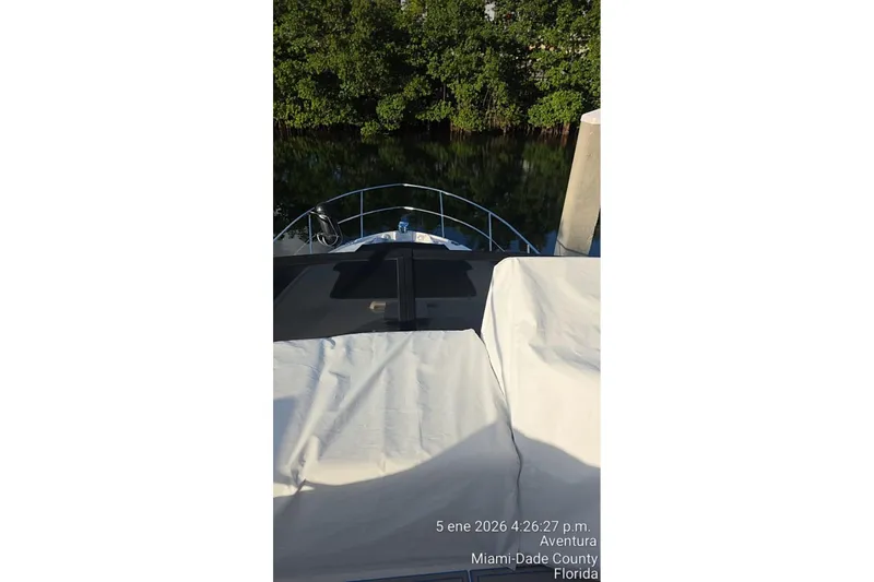 Slide: The Image of 2023 Regal 38 FXO yacht docked in Miami-Dade County, Florida. - 20