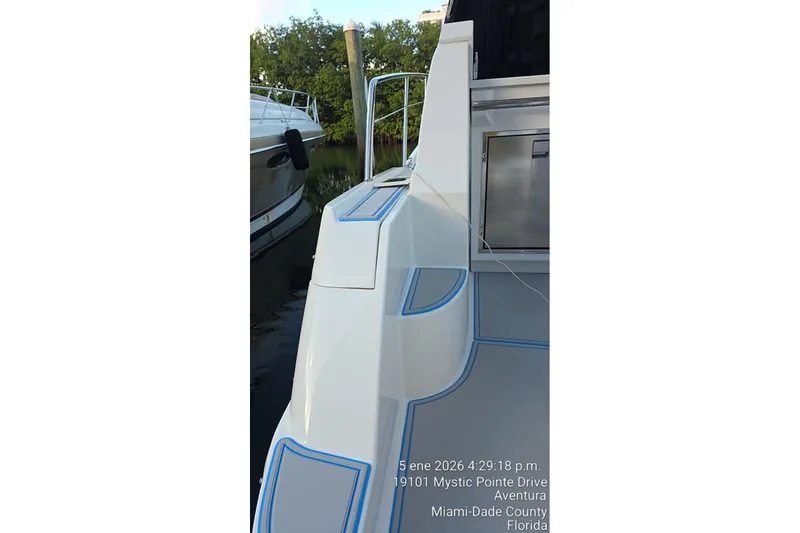 Slide: The Image of 2023 Regal 38 FXO yacht docked in Miami-Dade County, Florida. - 25