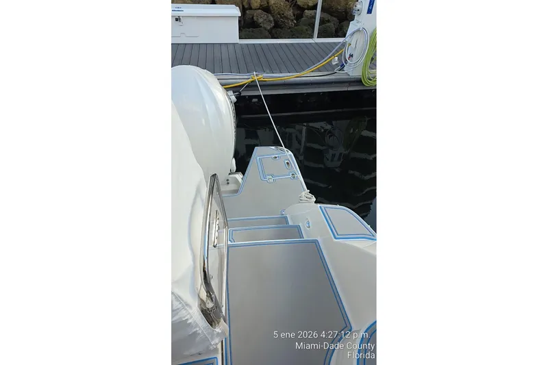 Slide: The Image of 2023 Regal 38 FXO boat interior with sleek flooring and modern design elements. - 27