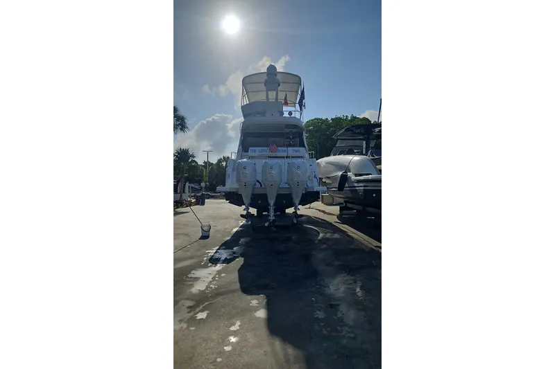 Slide: The Image of Interior view of 2023 Regal 38 FXO boat with covered seating and speaker. - 28