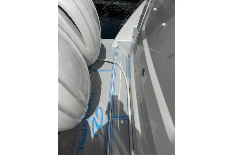Slide: The Image of Modern interior of 2023 Regal 38 FXO yacht with sleek design and geometric patterns. - 37