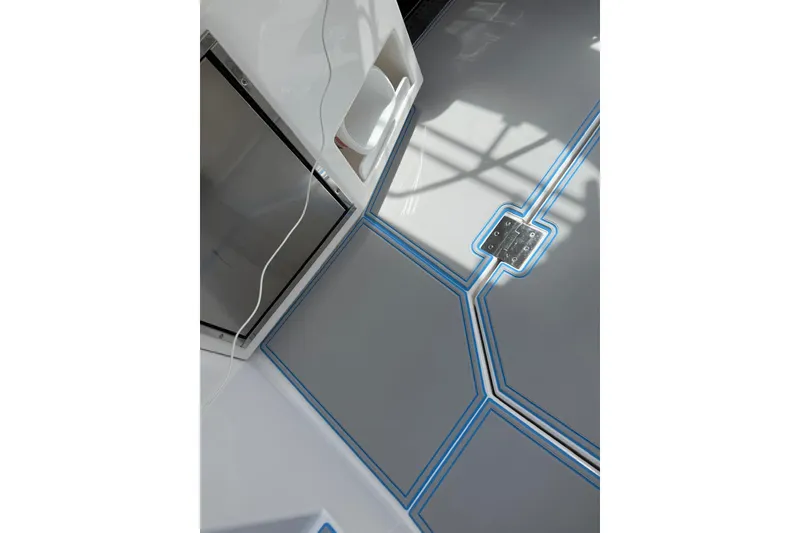 Slide: The Image of 2023 Regal 38 FXO boat docked, showcasing sleek design and modern detailing. - 39