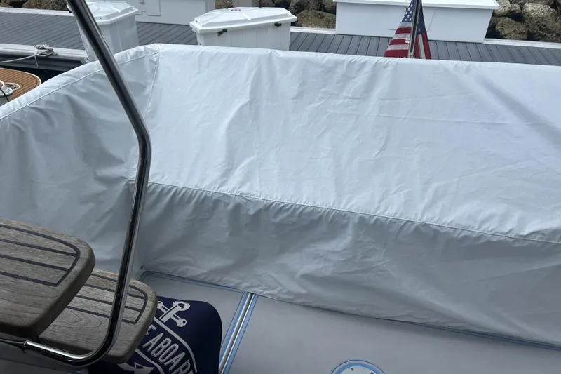 Slide: The Image of 2023 Regal 38 FXO engine compartment with generator and mechanical components. - 58