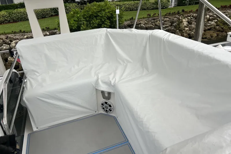 Slide: The Image of 2023 Regal 38 FXO boat stern with sleek design and modern fittings. - 59