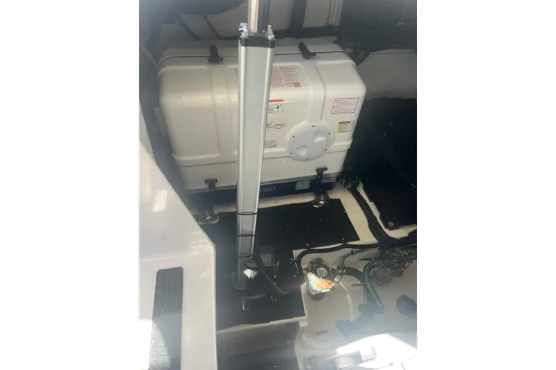 Slide: The Image of 2023 Regal 38 FXO yacht docked in Miami-Dade County, Florida, near lush greenery. - 60