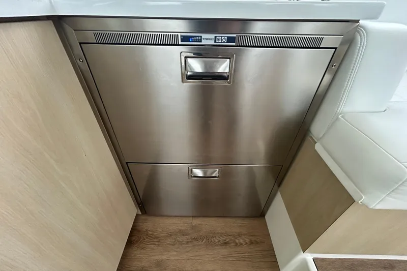 Slide: The Image of Stainless steel drawer in 2023 Regal 38 FXO yacht interior, featuring modern design. - 82