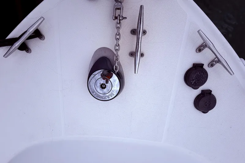 Slide: The Image of Bow of 2001 Wellcraft 290 Coastal with anchor chain and cleats. - 48