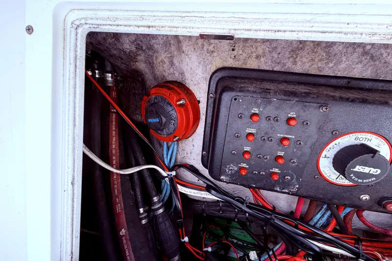 Slide: The Image of Electrical panel and wiring inside a 2001 Wellcraft 290 Coastal boat. - 70