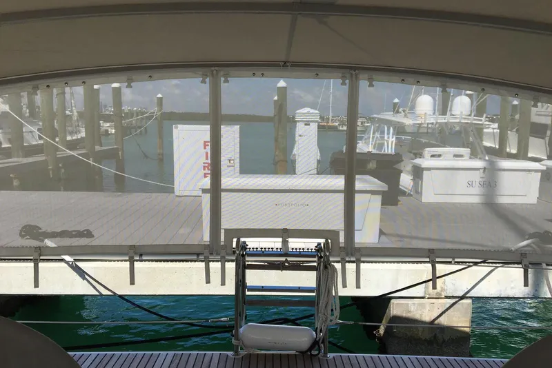 Slide: The Image of Beneteau Oceanis 45 yacht docked at marina, view from cockpit, 2013 model. - 9