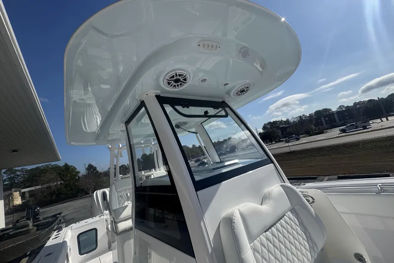 Slide: The Image of 2026 Sportsman Open 282 Center Console boat with sleek design and modern features. - 13