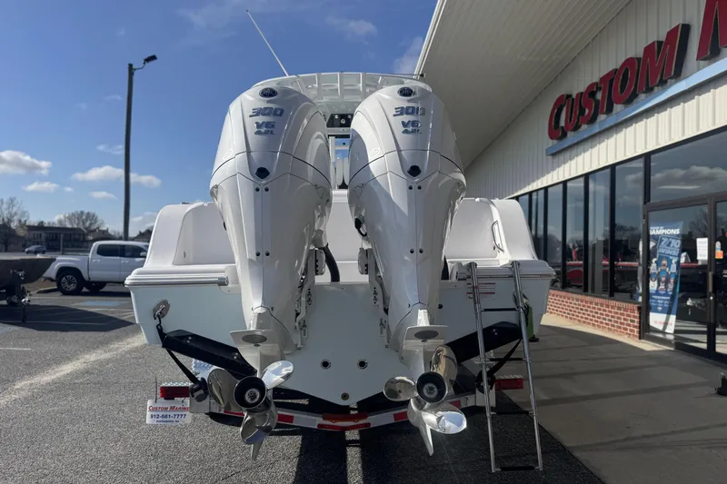Slide: The Image of 2026 Sportsman Open 282 Center Console with twin 300 V6 engines at a dealership. - 5