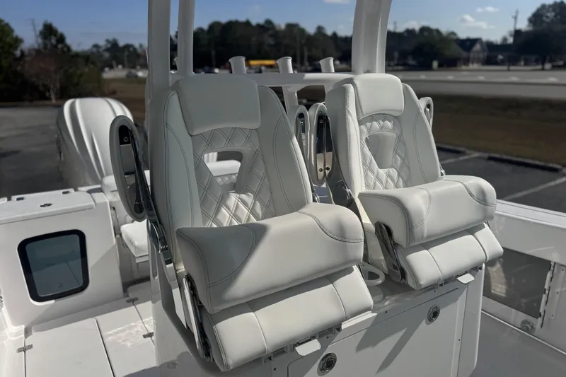 Slide: The Image of 2026 Sportsman Open 282 Center Console with luxurious white seating and modern design. - 6