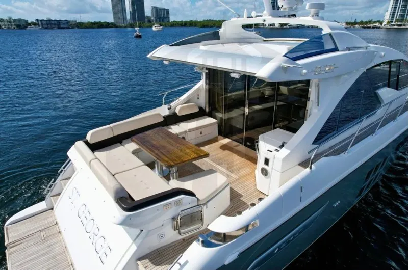 Slide: The Image of Luxurious 2015 Azimut 55S yacht with spacious deck and elegant seating area. - 13