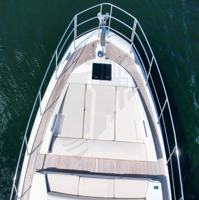 Slide: The Image of Azimut 55S 2015 yacht bow with sunbathing area and sleek design. - 17